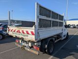a white truck that is parked in a parking lot