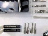 a lot of tools that are laying out on the table