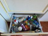 a drawer full of toiletries and hygiene products