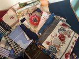 many different types of ties laid out on a table