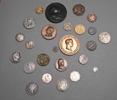 a lot of coins and a penny on a table