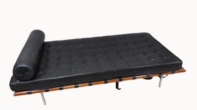 black leather futon bed with wooden frame and black mattress