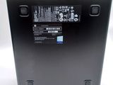 the back of a laptop with a battery attached to it