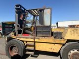 a forklift that is parked in the parking lot