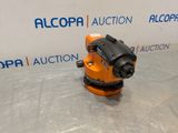 a close up of an orange and black object on a table