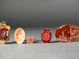 three pieces of glass with a picture of a man and a woman on them