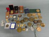 a lot of coins and other items on the table