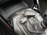 a car key in the center console of a car