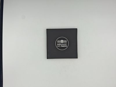 a picture of a sign on the wall of a bathroom