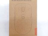 a box with a computer mouse in it on a white surface