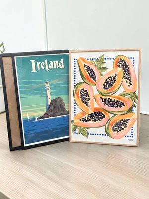two books sitting on a table next to each other