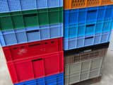 a stack of plastic crates stacked on top of each other