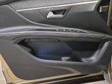 the door of a car with the driver ' s side door open