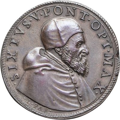 an old silver coin with a portrait of a man with a beard