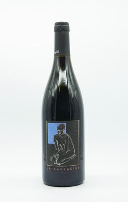 a bottle of wine that is sitting on a table