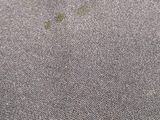 a close up of a piece of cloth with a hole in it