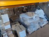 a lot of boxes that are stacked up on the shelf