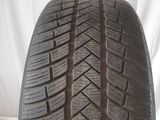 a close up of a tire on a white background