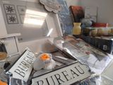 a pile of items on the counter in the kitchen