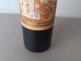 a bottle of wine that is sitting on a table