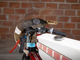 a close up of a motorcycle with a helmet on it