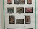 an old picture of a collection of stamps on display in a case