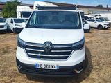 a white van that is parked in a lot