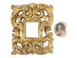 a gold frame with a picture of jesus on it