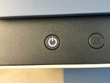 a close up view of a computer monitor with buttons on it