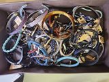 a box full of assorted bracelets and bracelets