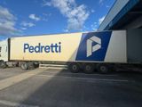 a large semi truck that is parked in a parking lot