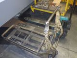 a picture of a machine that is sitting in a garage