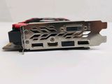 a close up of a metal device on a white surface