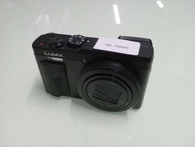 the camera is sitting on the table ready to be used