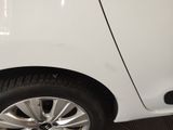 a close up of a car ' s tire on the floor