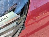 a close up of a car ' s tail light with an american flag on it