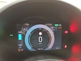 the dashboard of a car with a digital display on it