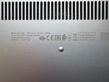 a close up of a silver laptop with a black keyboard
