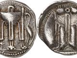 a silver coin with an image of a man and a woman on it