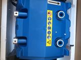 a box with a blue machine inside of it