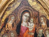 an image of a painting of a woman holding a baby in her arms