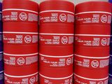 a lot of red and blue containers stacked on a shelf