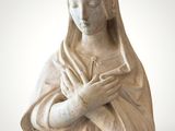a statue of a woman with a crown on her head