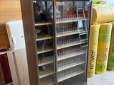a refrigerator that has a lot of bottles in it