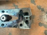 a close up of a metal clamp on the ground