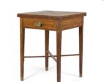 an old wooden table with a drawer on top of it