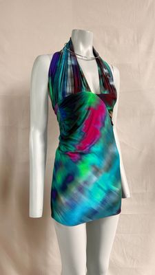 a mannequin wearing a colorful dress on a mannequin mannequin mannequin mannequin mannequin mannequin mannequin mann