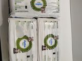 three packages of toilet paper stacked on top of each other