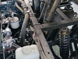 a close up of the engine of a motorcycle on the street