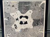 black and white drawing of a bear with a heart on it